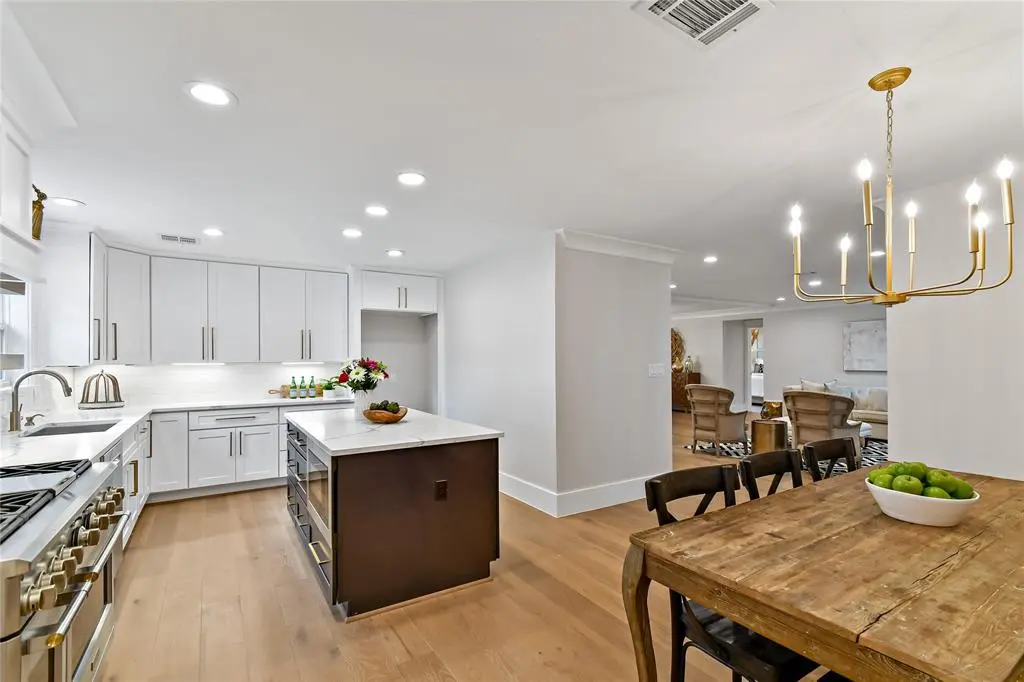 Bright bath vanity with twin mirrors